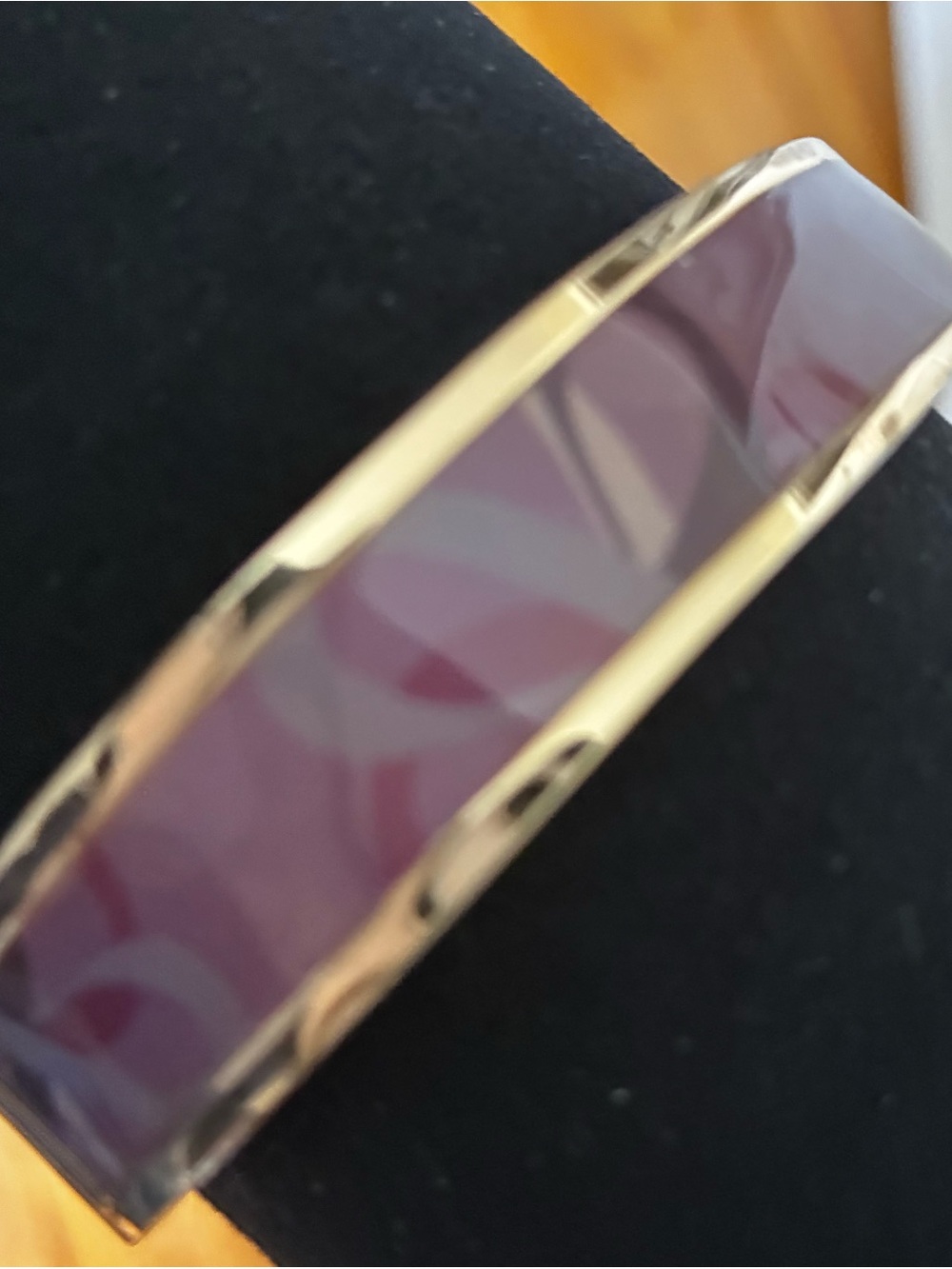 Avon oval bracelet with hues of purples